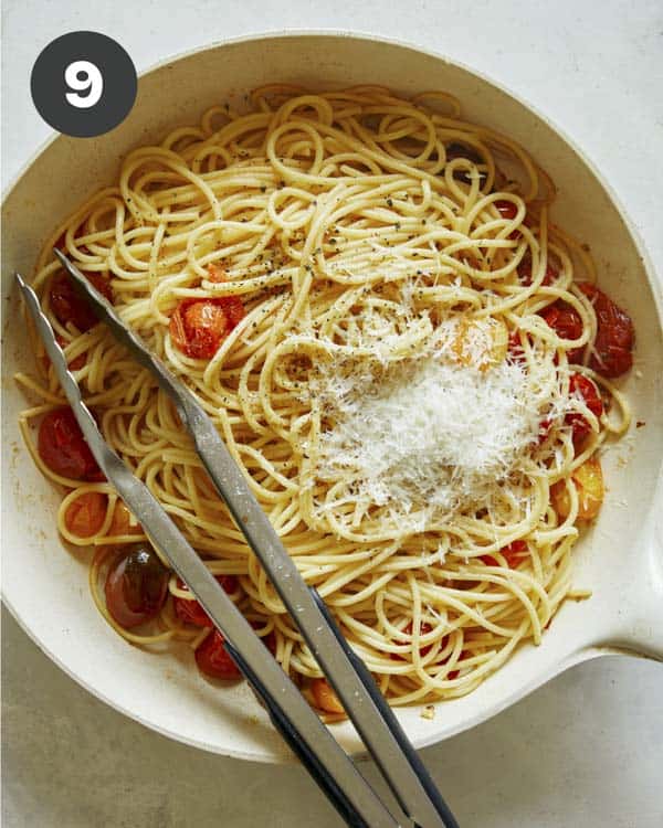 Roasted cherry tomato pasta with parmesan on top.