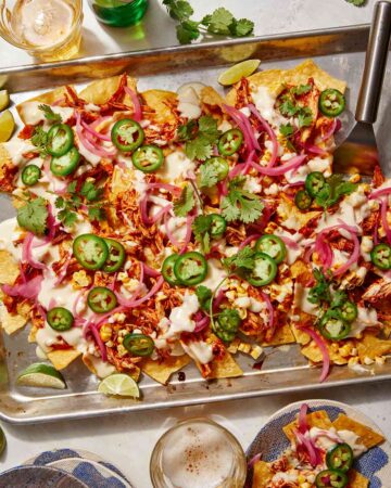 Chipotle chicken sheet pan nacho recipes with beer on the side.