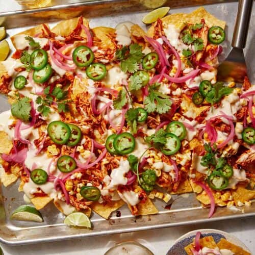 Chipotle chicken sheet pan nacho recipes with beer on the side.