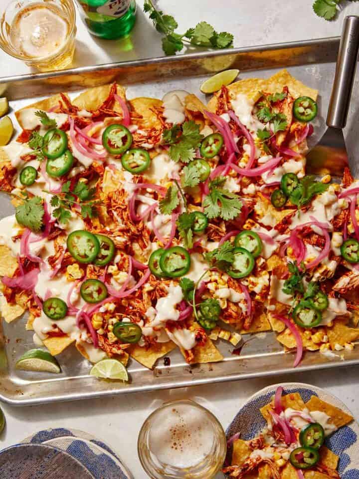 Chipotle chicken sheet pan nacho recipes with beer on the side.