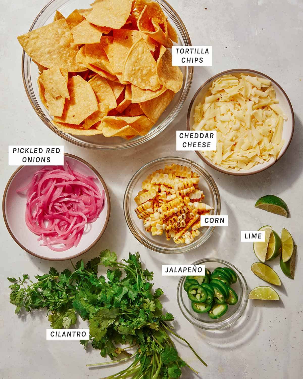 Chipotle chicken sheet pan nacho topping ingredients.
