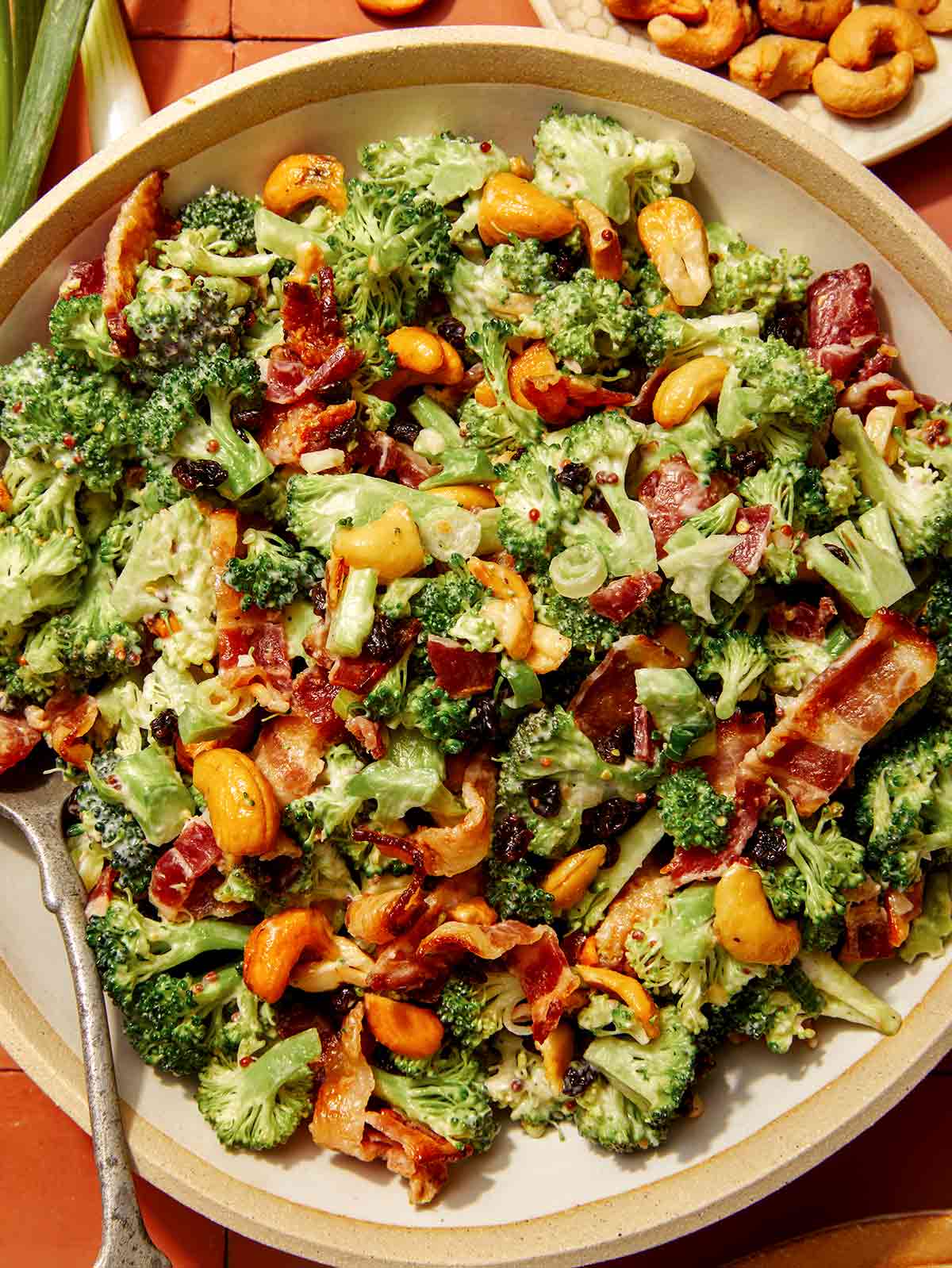 Close up on a broccoli salad recipe in a bowl.