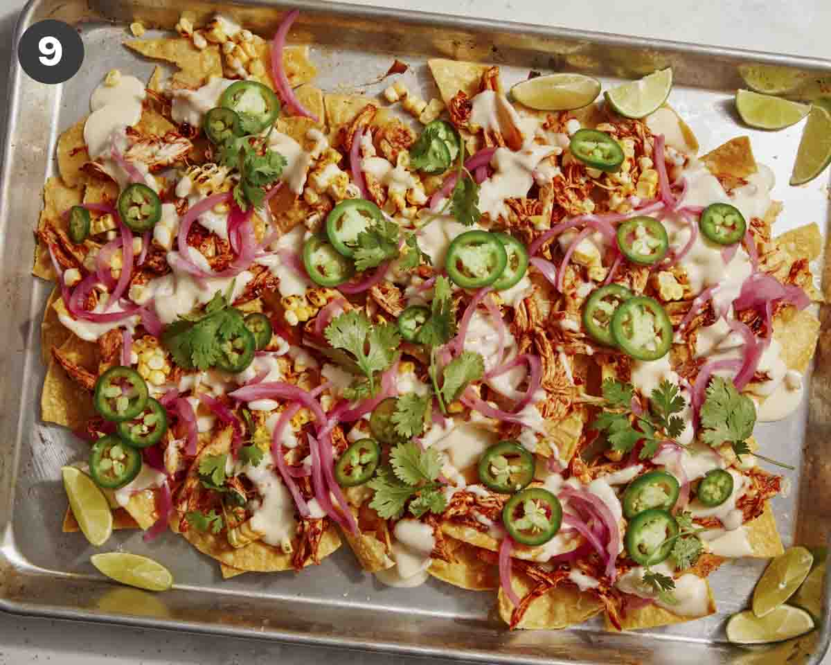 Chipotle chicken nachos on a pan. 