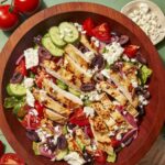 Greek salad recipe in a bowl.