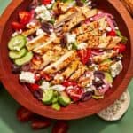 Greek salad in a wooden bowl.