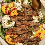 Grilled Steak Salad recipe in a platter.