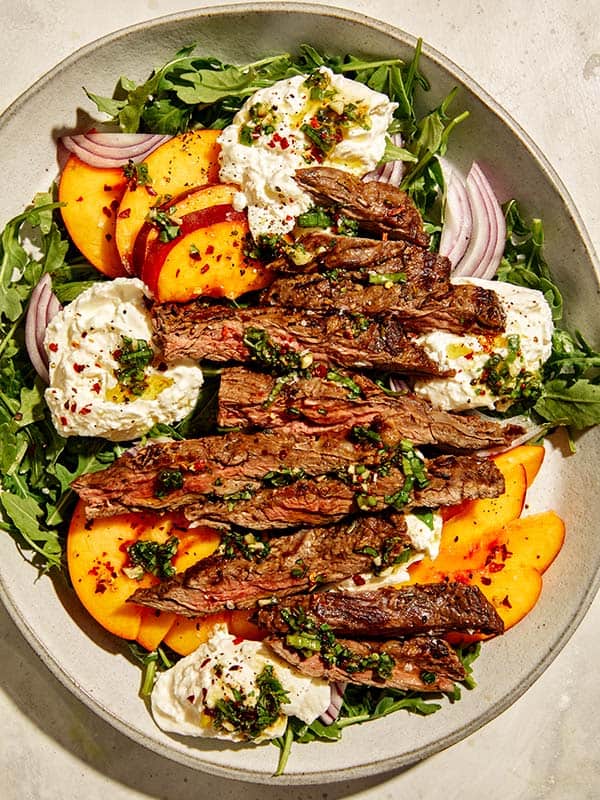 Lettuce with steak and burrata. 