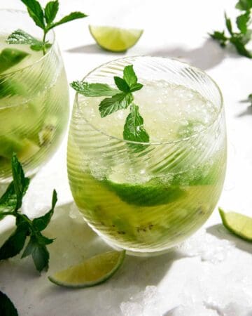 Kiwi Caipiroska recipe in two glasses.