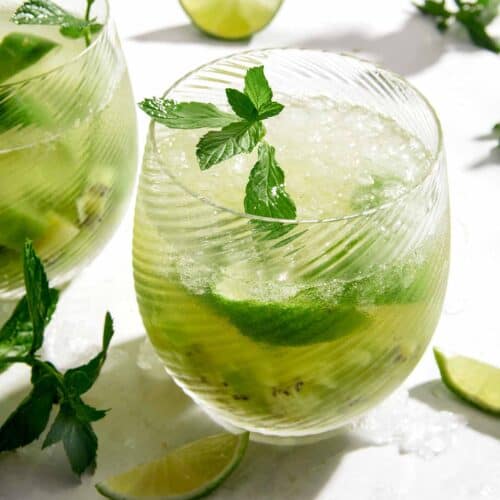 Kiwi Caipiroska recipe in two glasses.