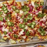 Chipotle chicken sheet pan nacho recipes with beer on the side.