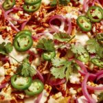 Close up on a pan of nachos.