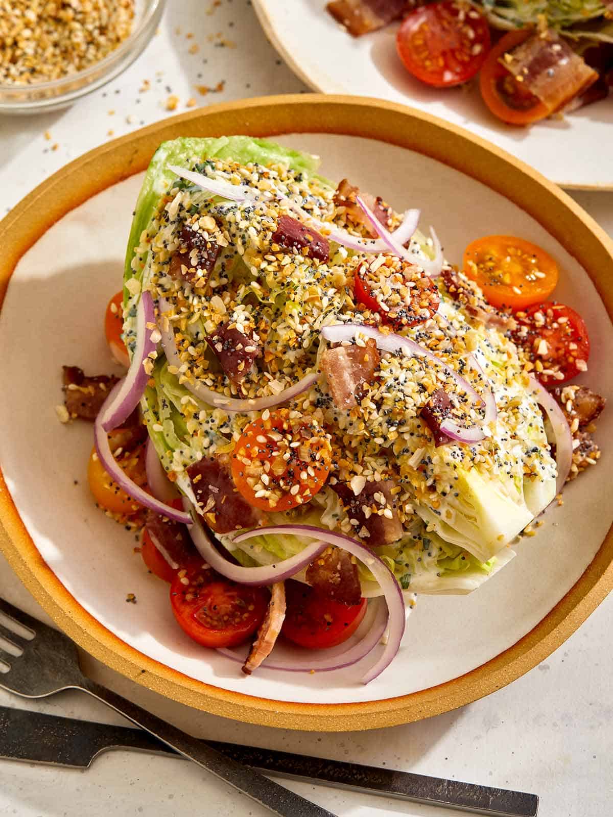 A fresh wedge salad in a bowl.