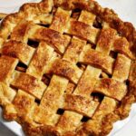 A whole apple pie recipe ready to be served.