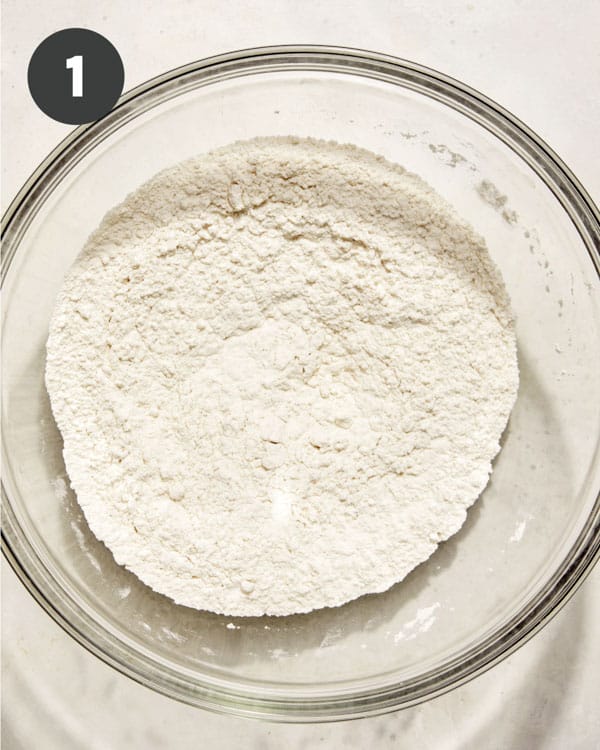 Flour mixture in a glass bowl.