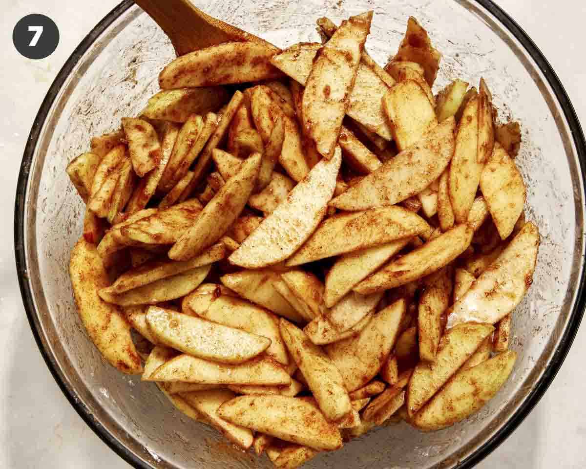 Apple pie filling mixed together in a bowl. 