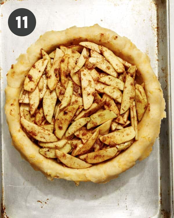 Pie crust with apple filling before it's baked.