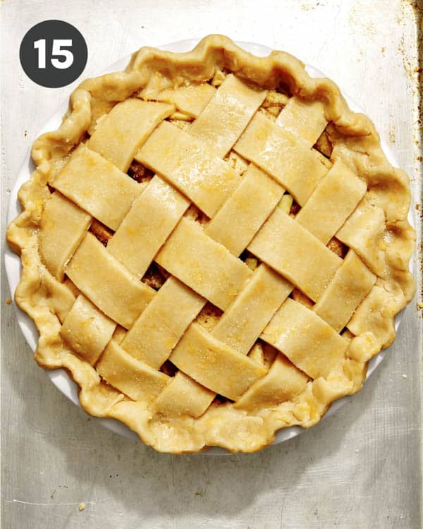 Apple pie on a baking sheet.
