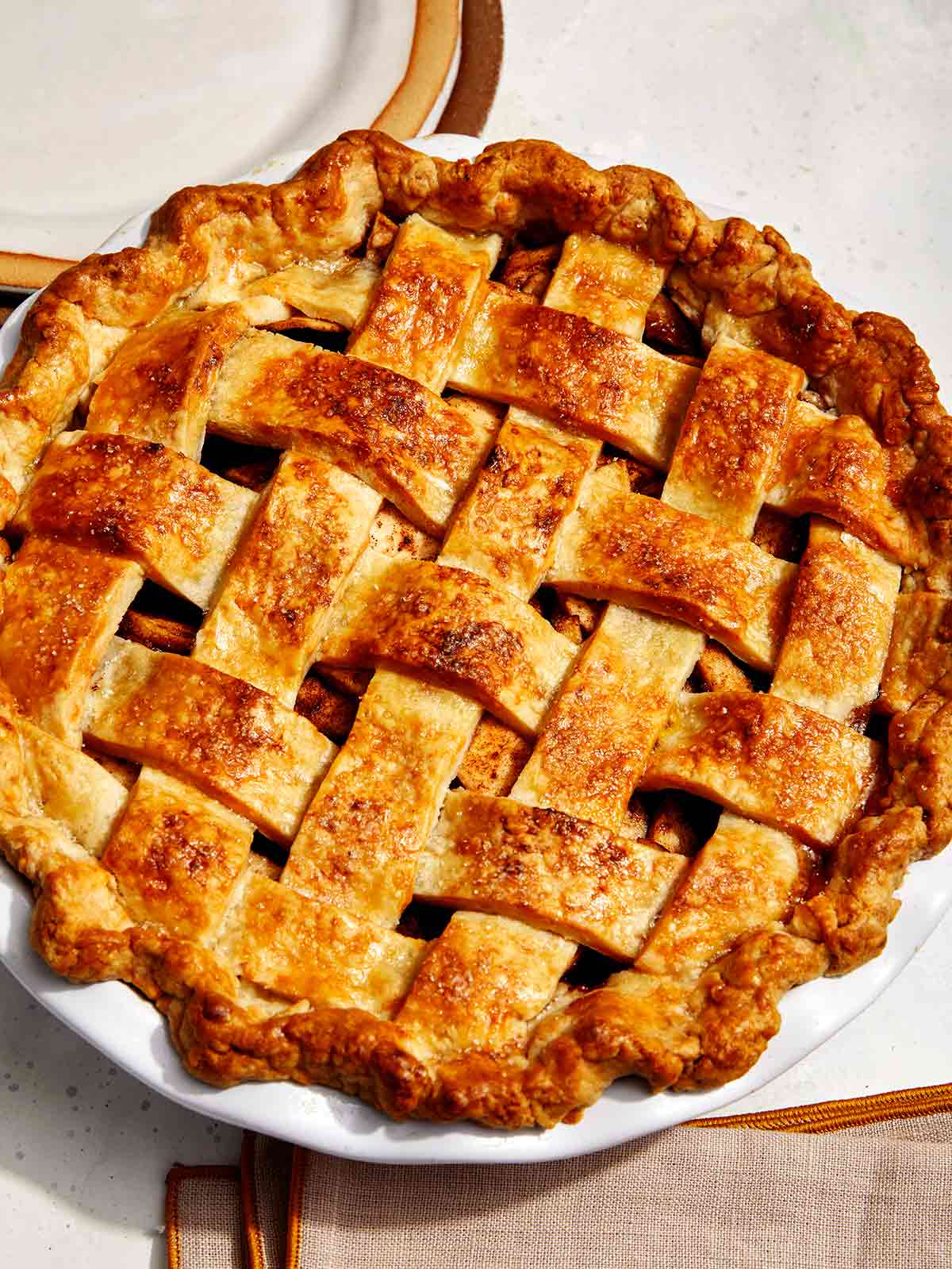 A whole apple pie recipe ready to be served.