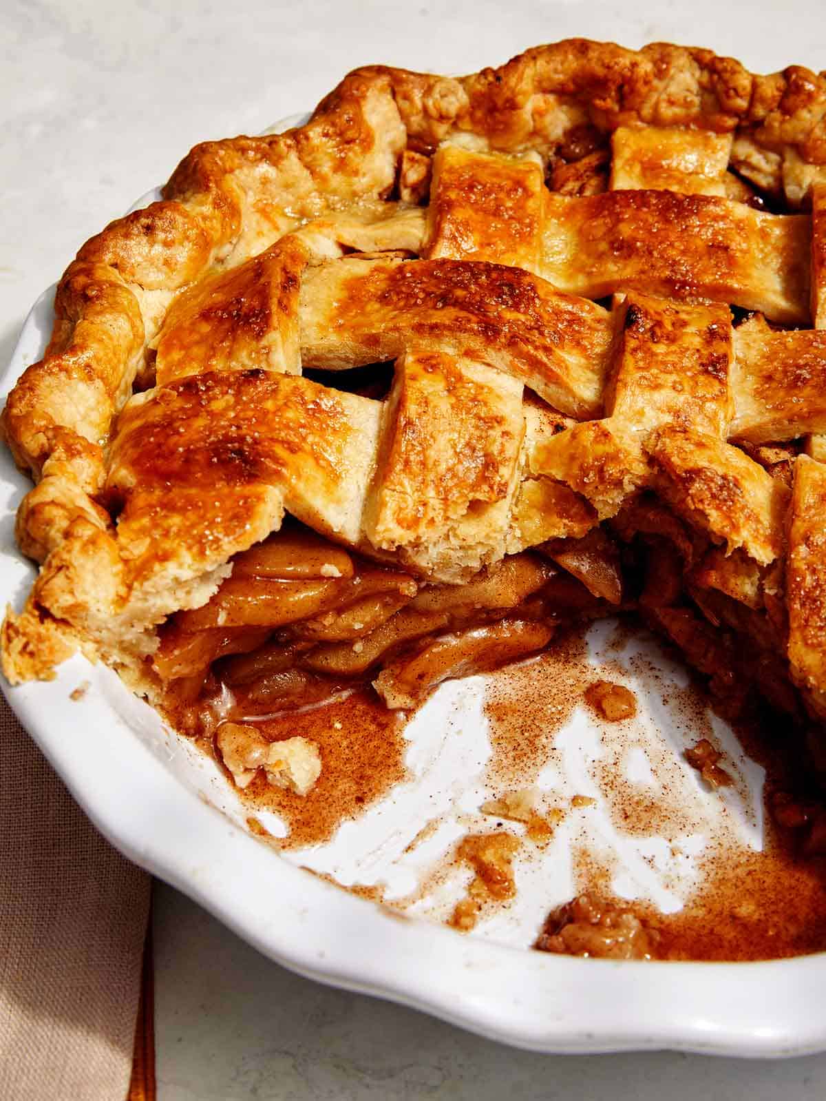 A view into a slice of apple pie with cheddar crust. 