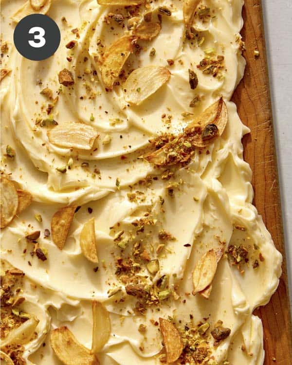 Butter topped with nuts and fried garlic.