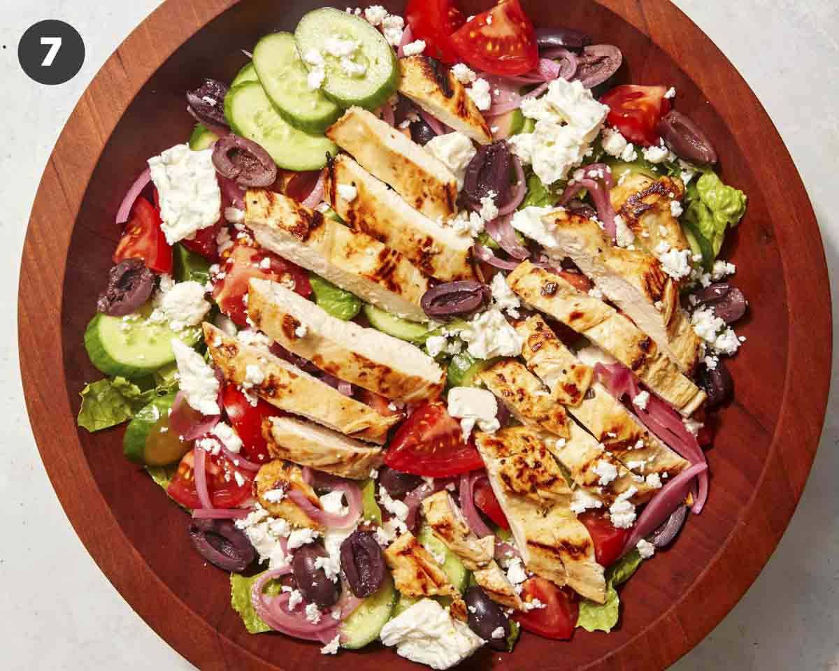 A greek salad in a wooden bowl. 