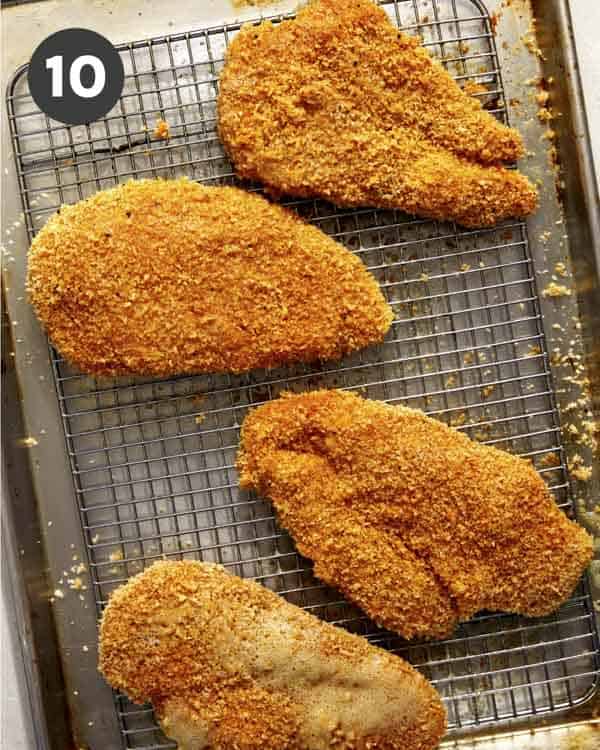 Panko coated chicken breasts sprayed with cooking oil. 