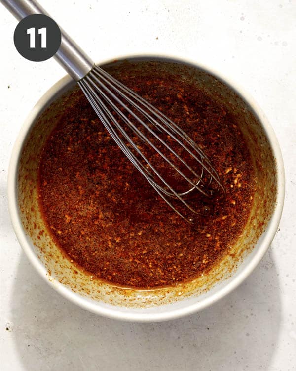 The spicy honey mixture whisked in a bowl. 