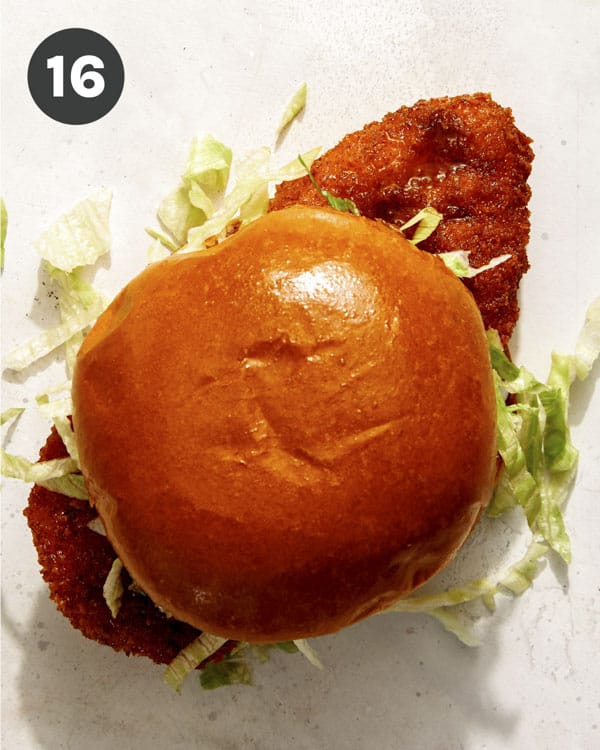 A hot honey chicken sandwich recipe made on a kitchen counter. 