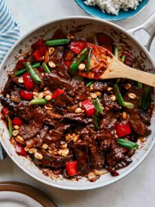 Kung pao beef in a skillet.