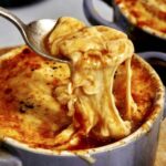 French onion soup recipe in bowls.