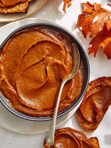 A sweet pumpkin butter recipe in a bowl and smeared on toast.