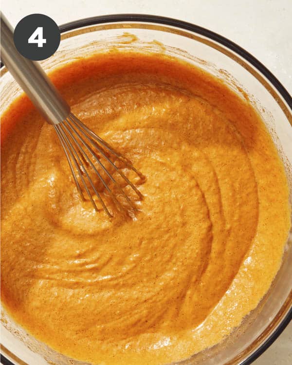 Pumpkin pie filling whisked together in a bowl. 