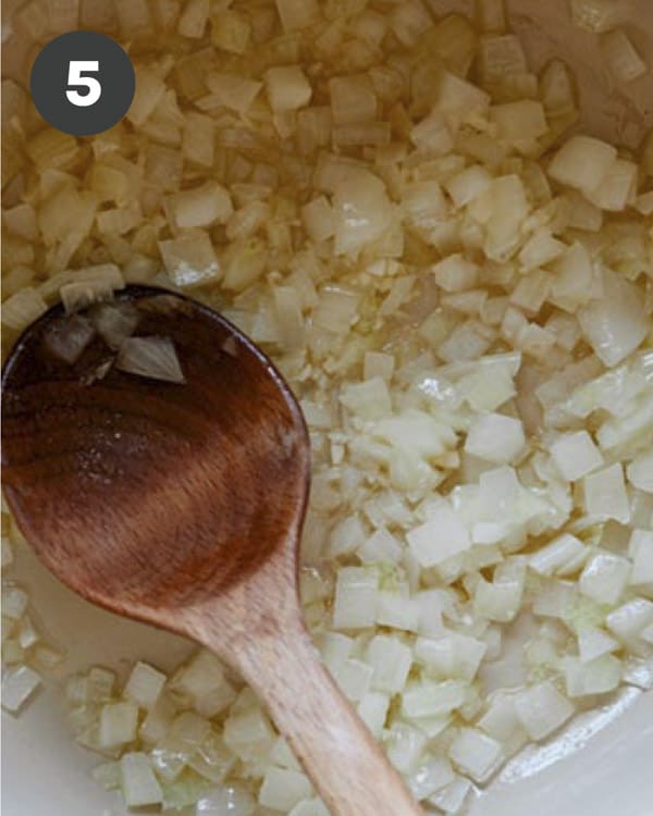 Sautéd onion and garlic in a pot.