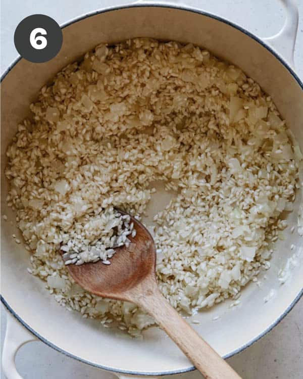 To make risotto add rice to the onion and garlic.