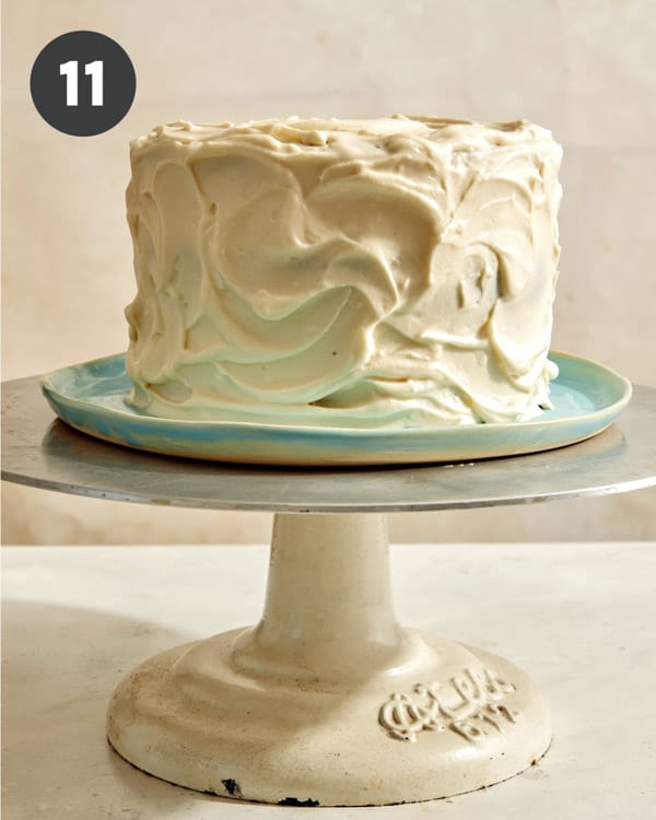 A smash cake frosted with whipped cream. 