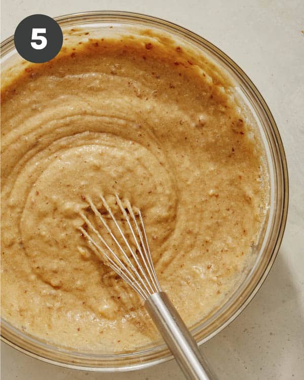 Smash cake batter in a glass bowl.