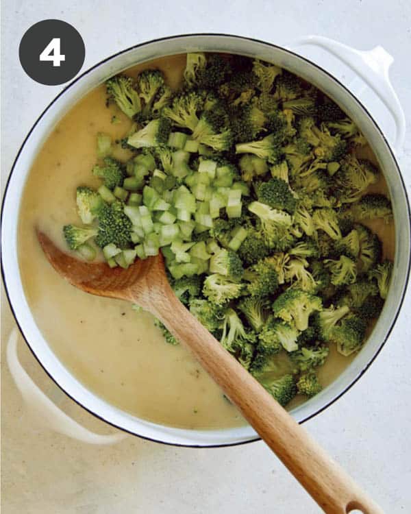 Broccoli and celery combined with a stock to make the start of broccoli cheddar soup.