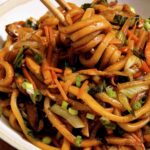 Yaki udon noodles in a bowl.