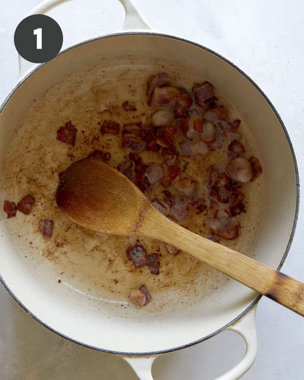 Bacon cooking in a pot for zuppa toscana.