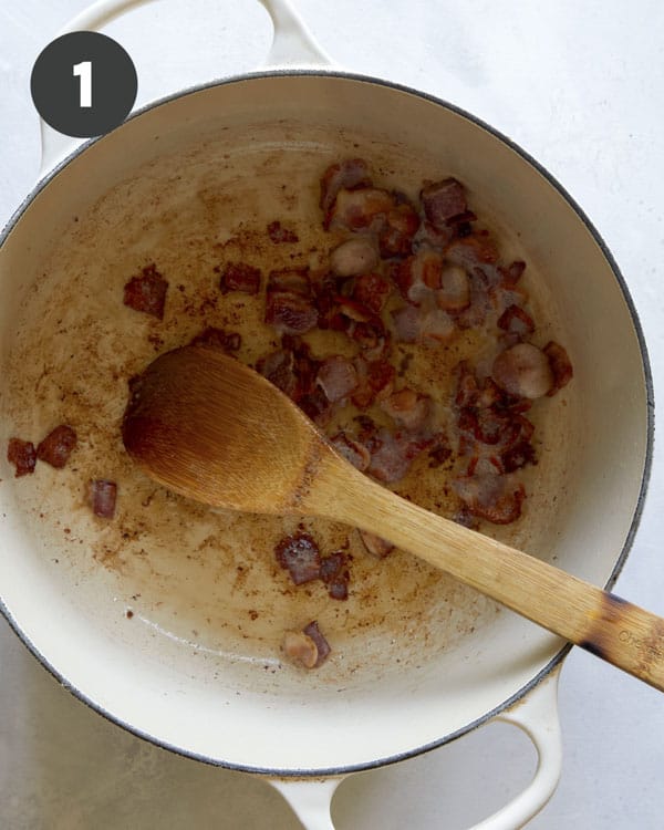 Bacon cooking in a pot for zuppa toscana. 