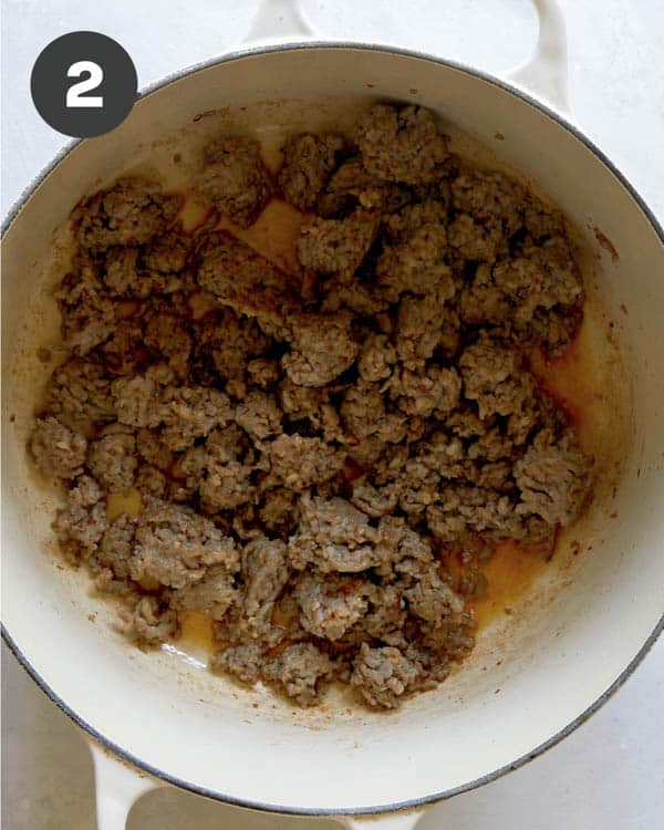 Italian sausage browned in a pot to make zuppa toscana soup.