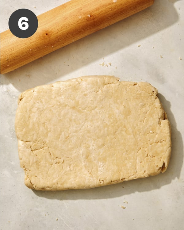 Buttermilk biscuit dough rolled into a slab.