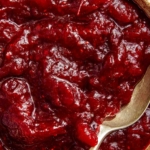 Close up on a bowl of cranberry sauce.