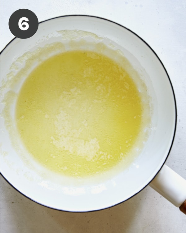 Butter melted in a saucepan to make gravy.