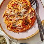 Creamy gochujang noodles in a bowl.