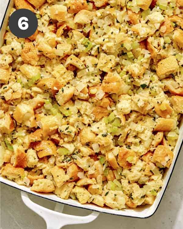 Stuffing in a baking dish getting ready to be baked. 