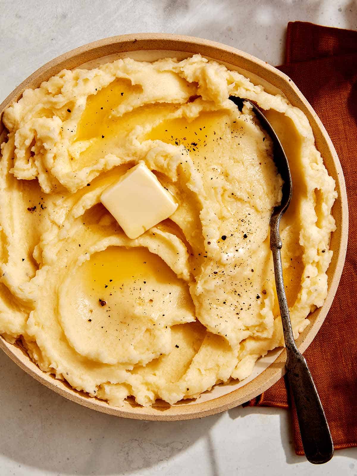 Mashed potato recipe with butter melted. 