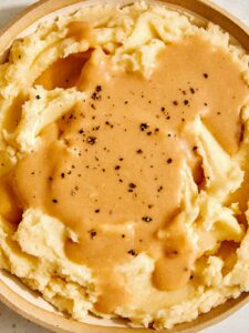 Roasted garlic gravy over mashed potatoes.