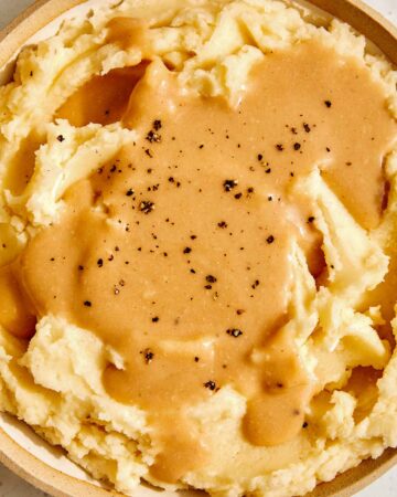 Roasted garlic gravy over mashed potatoes.