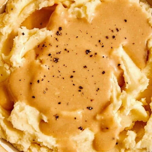 Roasted garlic gravy over mashed potatoes.